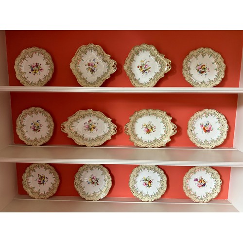 240 - A 19thC dessert service (12 pieces) with hand painted and gilded decoration.