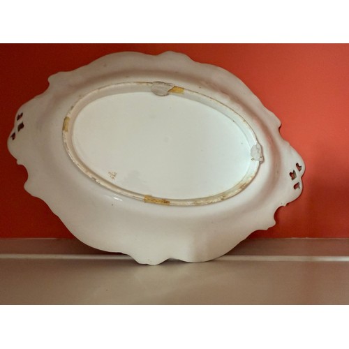 240 - A 19thC dessert service (12 pieces) with hand painted and gilded decoration.