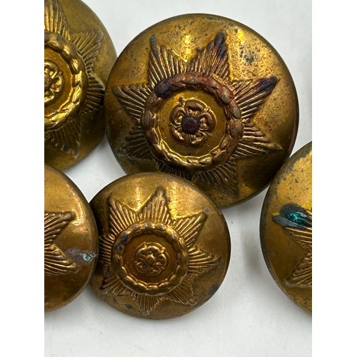 A collection of military brass buttons to include Royal Navy, East ...