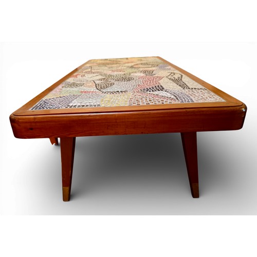 169 - Mid 20thC ceramic mosaic topped coffee table 95cm x 43cm x 32cm h together with a magazine rack.