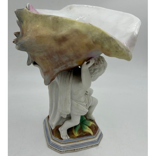 230 - A 19thC hand painted cherub bisque centrepiece with two putti and seashell together with 2 x hand pa... 