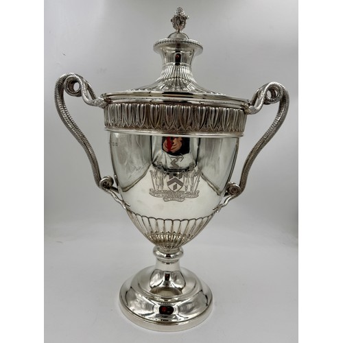 948 - A very large impressive hallmarked silver lidded trophy with snake handles, presented to the Worship...
