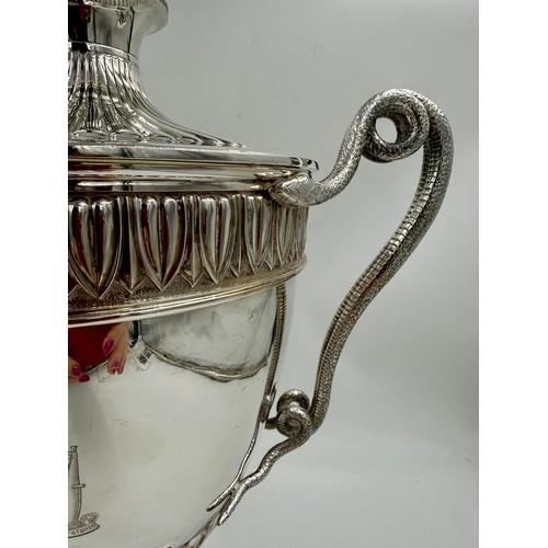 948 - A very large impressive hallmarked silver lidded trophy with snake handles, presented to the Worship... 
