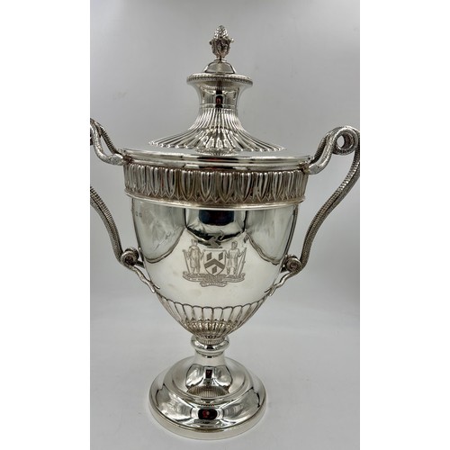 948 - A very large impressive hallmarked silver lidded trophy with snake handles, presented to the Worship... 