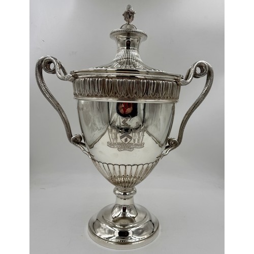 948 - A very large impressive hallmarked silver lidded trophy with snake handles, presented to the Worship... 