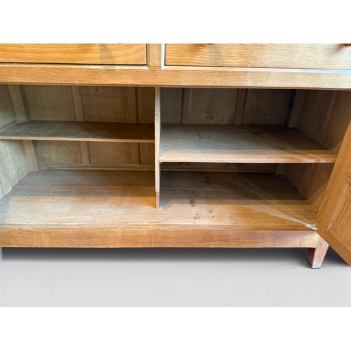 Peter Heap ‘Rabbitman’ oak dresser. 122 w x 46 d x 177cm h.