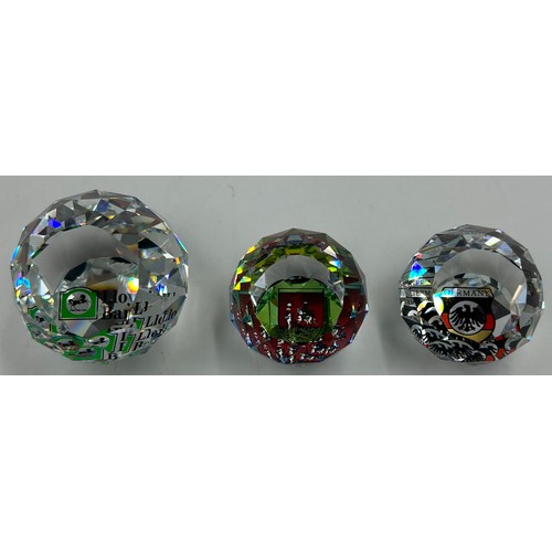 477 - Swarovski Crystal Glass to include nine vitrail paperweights, largest 5cm h, 5 with logos Lloyds Ban... 