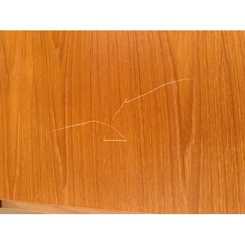 179 - A Möbler Denmark extending dining table. Extended 164cm l x 84cm w x 75cm h. Closed 85cm x 85cm.