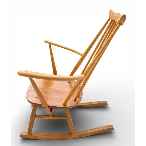 180 - A mid 20thC Ercol rocking chair.