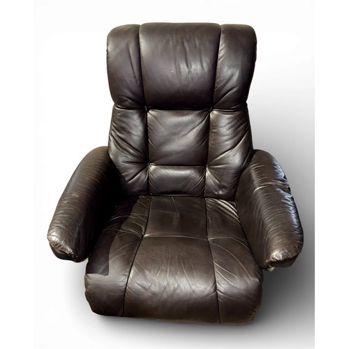 160 - A dark brown leather Stressless style reclining armchair and footstool.