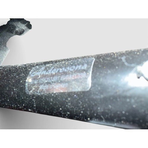 162 - A Danish brown leather recliner and footstool by Andersson.