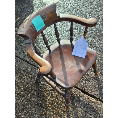 83 - A child’s oak captain’s armchair with Edith carved to back. 34cm h to back, 33cm w x 34cm d.