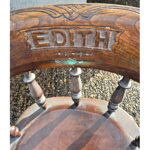 83 - A child’s oak captain’s armchair with Edith carved to back. 34cm h to back, 33cm w x 34cm d.