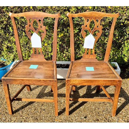 85 - A pair of 19thC country Chippendale style chairs with solid seats. 92cm h to back, 55cm w x 49cm d.