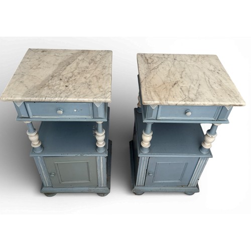 96 - A pair of painted pine bedside cabinets with marble tops. 79cm h x 42cm w x 41cm d.