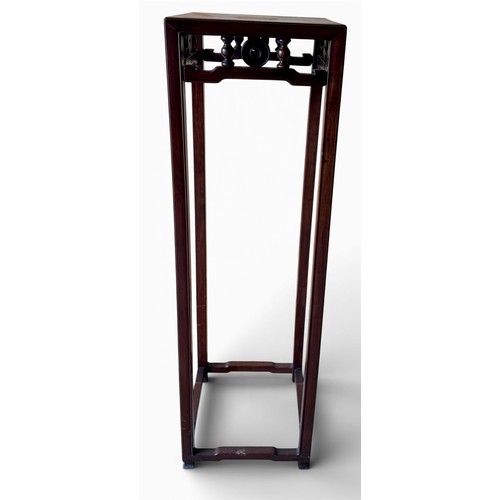 126 - An oriental hardwood stand. 34cm x 34cm x 116cm h.