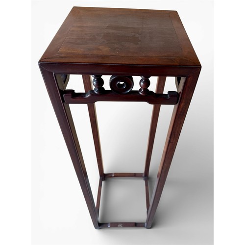 126 - An oriental hardwood stand. 34cm x 34cm x 116cm h.