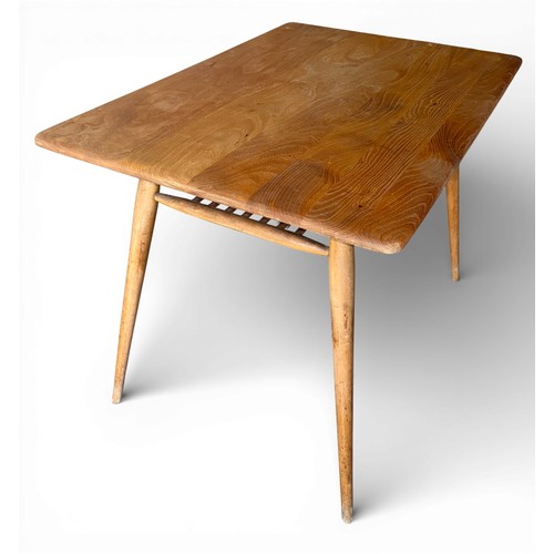 187 - An Ercol 393 breakfast table with under shelf. 99cm w x 68.5cm d x 74cm h.
