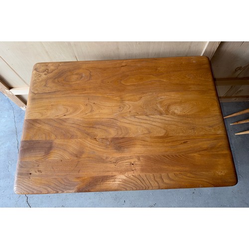 187 - An Ercol 393 breakfast table with under shelf. 99cm w x 68.5cm d x 74cm h.