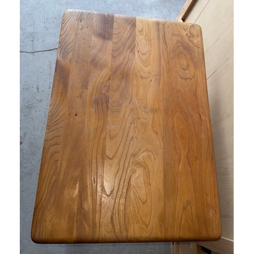 187 - An Ercol 393 breakfast table with under shelf. 99cm w x 68.5cm d x 74cm h.