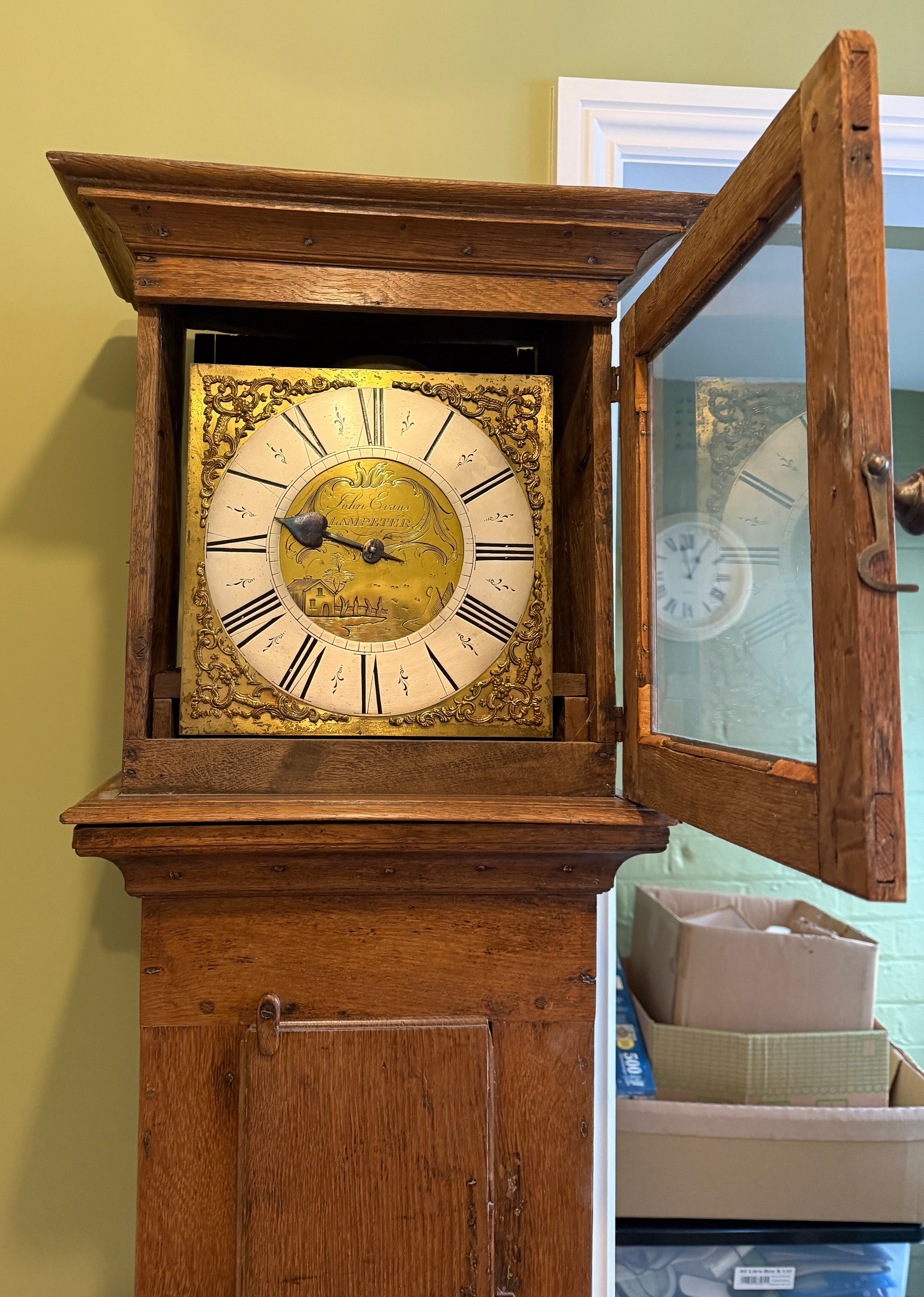 An oak 30 hour longcase clock with brass face, John Evans, Lampeter ...