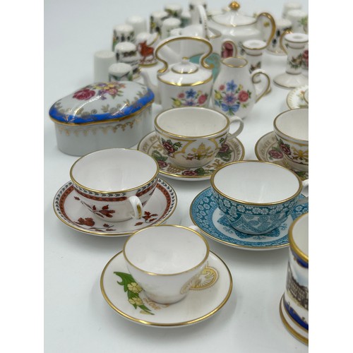 419 - Various porcelain miniatures to include mainly Spode, 2 x Royal Doulton twin handled loving cups, Co... 