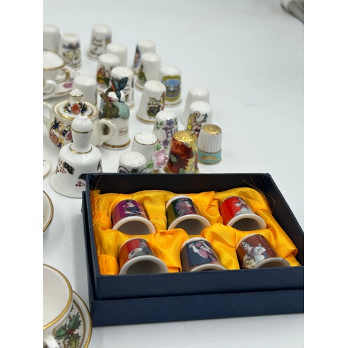 419 - Various porcelain miniatures to include mainly Spode, 2 x Royal Doulton twin handled loving cups, Co... 