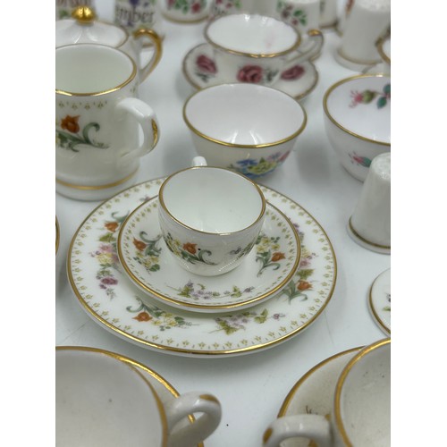 419 - Various porcelain miniatures to include mainly Spode, 2 x Royal Doulton twin handled loving cups, Co... 