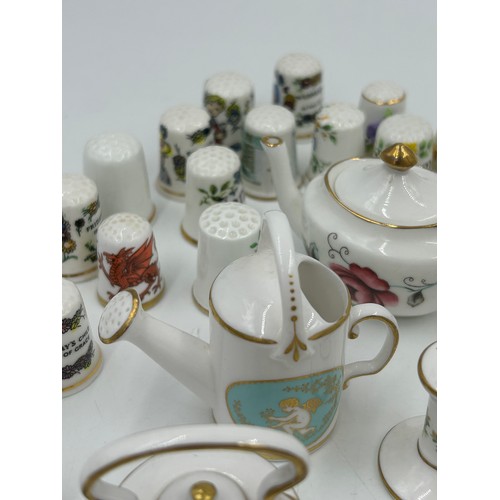 419 - Various porcelain miniatures to include mainly Spode, 2 x Royal Doulton twin handled loving cups, Co... 