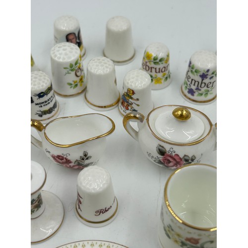 419 - Various porcelain miniatures to include mainly Spode, 2 x Royal Doulton twin handled loving cups, Co... 