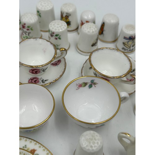 419 - Various porcelain miniatures to include mainly Spode, 2 x Royal Doulton twin handled loving cups, Co... 
