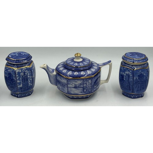 426 - Blue and white ceramics to include Ringtons 'bridge' teapot to include The Humber Bridge, 2 x hexago... 