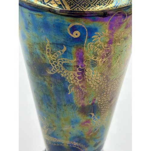 430 - A pair of Royal Doulton stoneware Sleeve Vases, decorated with 'Tube lined' designs 32cm with impres... 