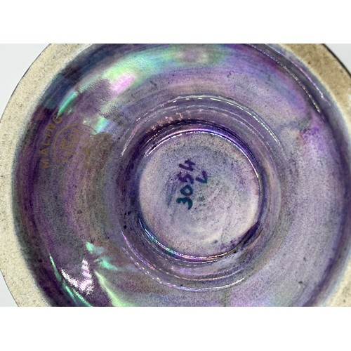 430 - A pair of Royal Doulton stoneware Sleeve Vases, decorated with 'Tube lined' designs 32cm with impres... 