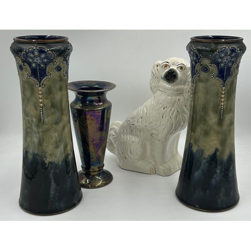 430 - A pair of Royal Doulton stoneware Sleeve Vases, decorated with 'Tube lined' designs 32cm with impres... 