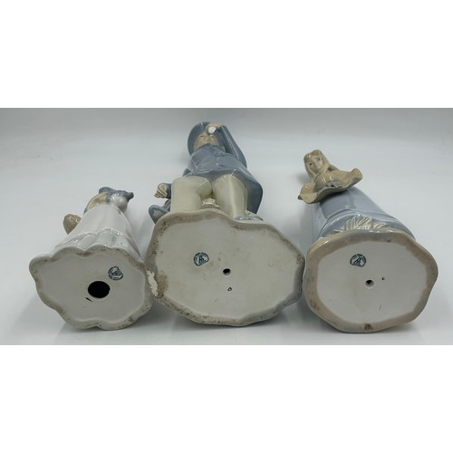 432 - Three Porcelanas Miquel Requena figurines to include Girl with puppy, Girl with hat and Valencia Gen... 