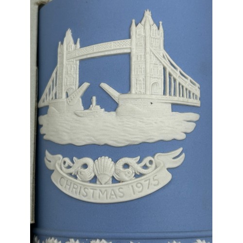 442 - Wedgwood blue jasperware to include a footed fruit bowl 20cm d x 13cm h and 6 x Christmas Mugs 11cm ... 