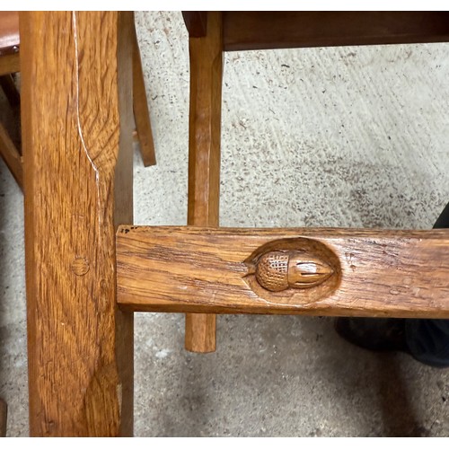 207 - An Alan ‘Acornman’ Grainger refectory dining table and six leather seated chairs including two carve... 