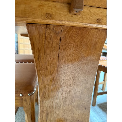 207 - An Alan ‘Acornman’ Grainger refectory dining table and six leather seated chairs including two carve... 