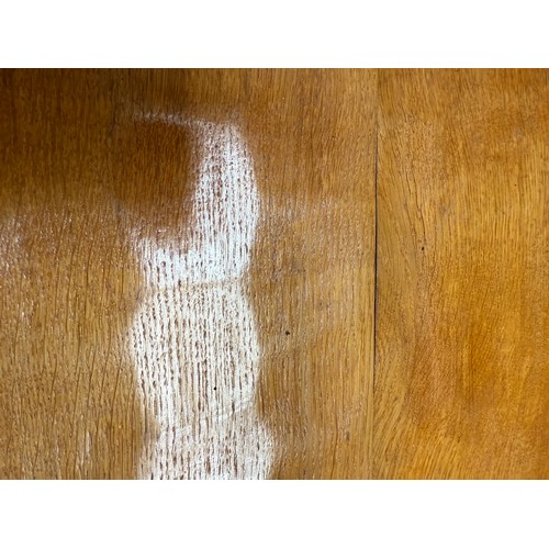 207 - An Alan ‘Acornman’ Grainger refectory dining table and six leather seated chairs including two carve... 