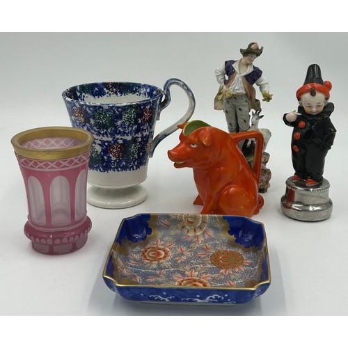 453 - A selection of continental ceramics to include a Royal Bayreuth pig creamer, cranberry opaline glass... 