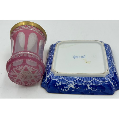 453 - A selection of continental ceramics to include a Royal Bayreuth pig creamer, cranberry opaline glass... 