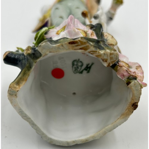 453 - A selection of continental ceramics to include a Royal Bayreuth pig creamer, cranberry opaline glass... 