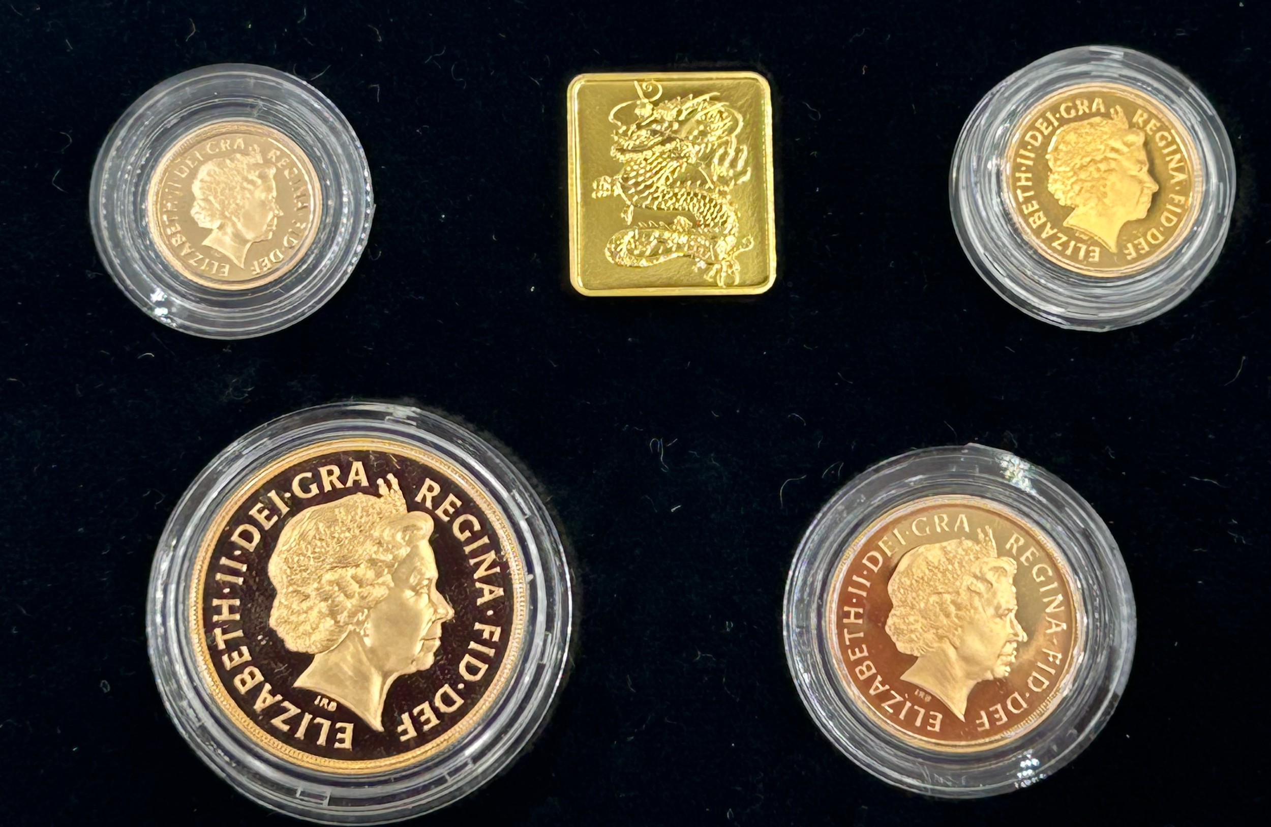 A cased Royal Mint 2000 Gold Proof Four-Coin Sovereign Collection ...