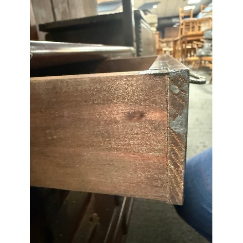 125 - An oriental cabinet with two shelves and two drawers over cupboard with brass fittings. 50cm w x 33c... 