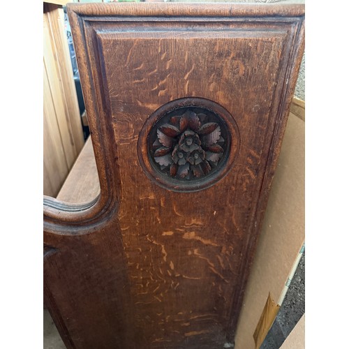 10 - A 19thC oak pew with floral roundel to one end by Sir George Gilbert Scott. Removed from St Mary Chu... 