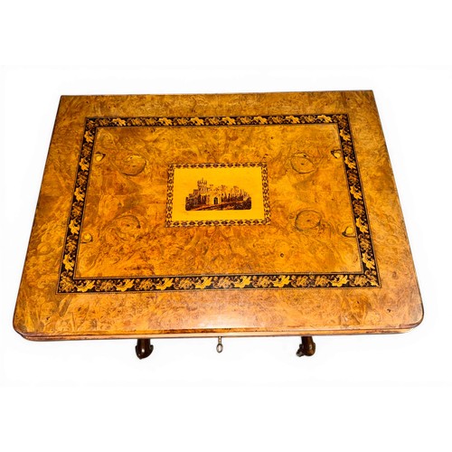 12 - A nineteenth century Tunbridge ware inlaid games/work table, possibly depicting Eridge Castle. 59cm ... 