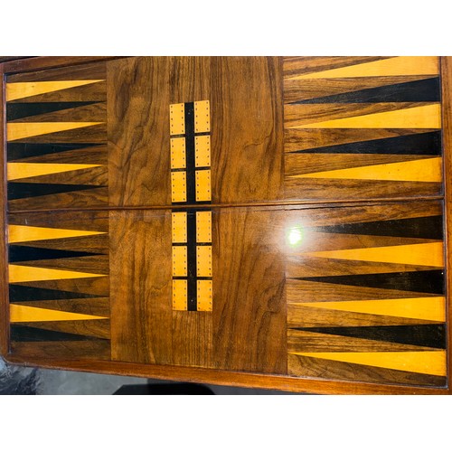 12 - A nineteenth century Tunbridge ware inlaid games/work table, possibly depicting Eridge Castle. 59cm ... 