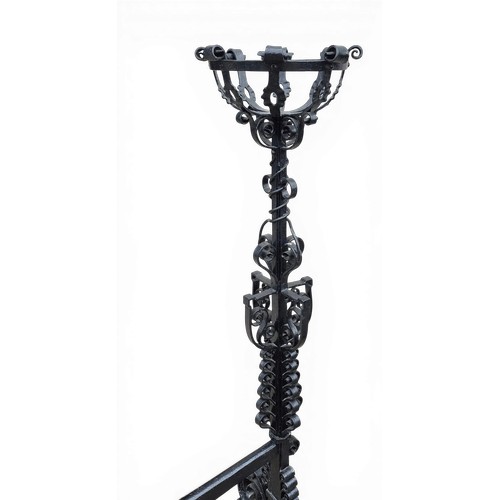 2 - Two wrought iron andirons with basket tops. 112cm h x 30cm w x 68cm d.