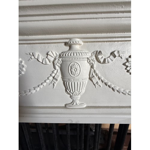 4 - A 19thC cast iron fire surround. Opening 38” x 38”.